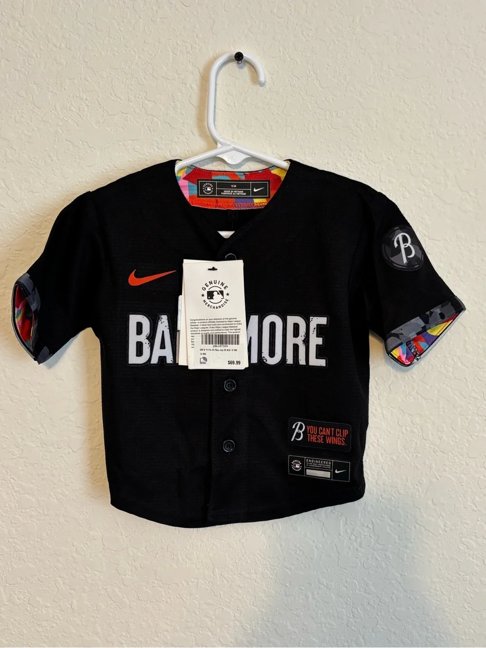 Nike Black Baltimore Kids Baseball Jersey with Orange Swoosh